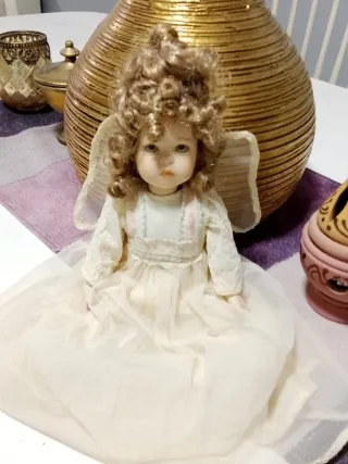 Muñeca de porcelana vintage