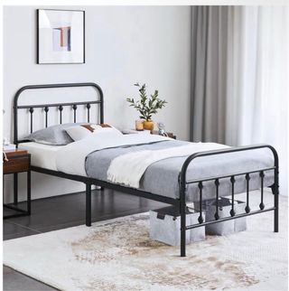 Cama individual de metal negra y colchon