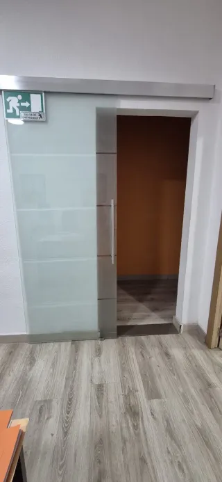 Puerta corredera de cristal