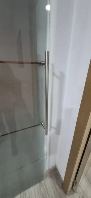 Puerta corredera de cristal