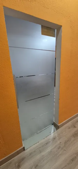 Puerta corredera de cristal