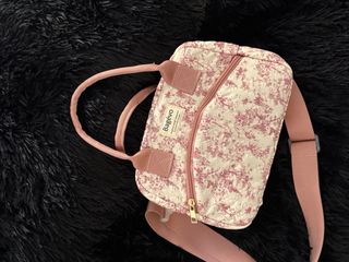 Pañalera pequeña floral rosa