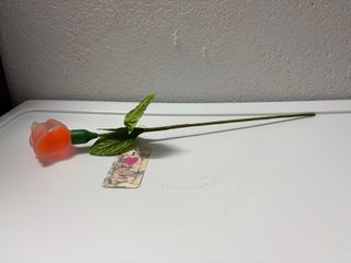 Perfume en forma de rosa