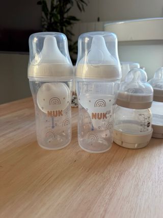 6 Biberones NUK + Esterilizador Philips Avent