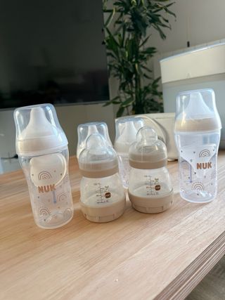 6 Biberones NUK + Esterilizador Philips Avent
