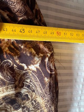 Tuta elegante con stampa animalier