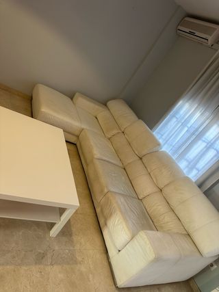 Sofá seccional de piel blanco