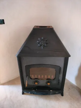 Estufa de leña negra, precio negociable