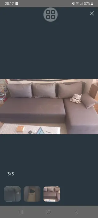 Sofá cama gris de tela