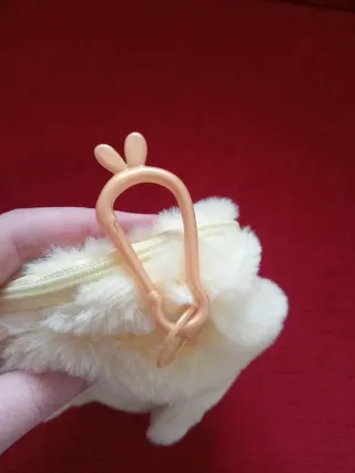 Na Na Na Surprise pochette coniglio giallo peluche