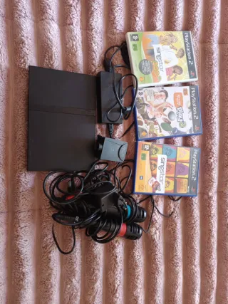 PlayStation 2 Negra + Juegos Singstar