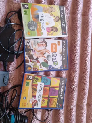 PlayStation 2 Negra + Juegos Singstar