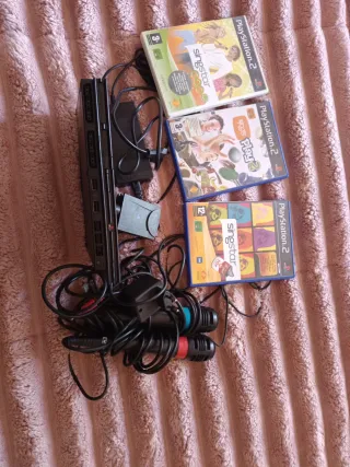 PlayStation 2 Negra + Juegos Singstar