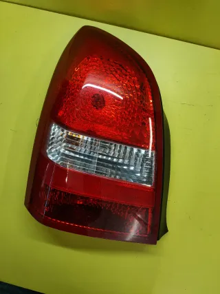 PILOTO TRASERO IZQUIERDO NISSAN PRIMERA P12 4P