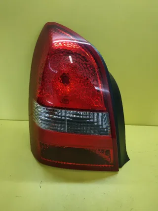 PILOTO TRASERO IZQUIERDO NISSAN PRIMERA P12 4P