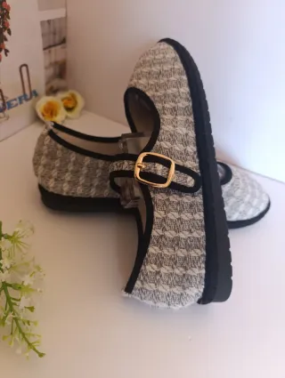 Zapatos planos con hebilla