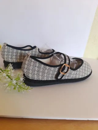 Zapatos planos con hebilla