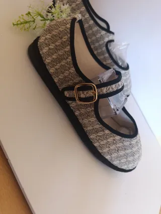 Zapatos planos con hebilla