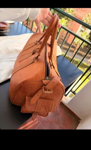 Bolso de viaje vintage de cuero marrón