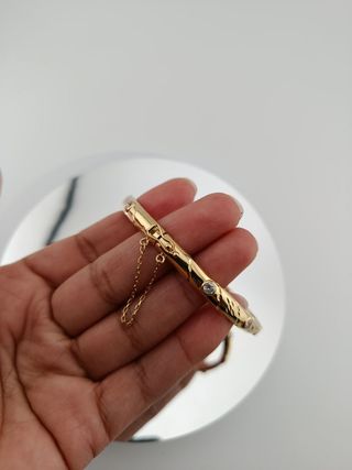 Pulsera dorada con circonitas