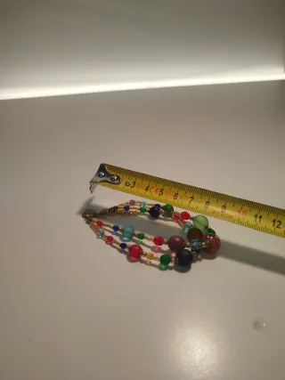 Bracciale con pietre colorate e ciondolo a cuore