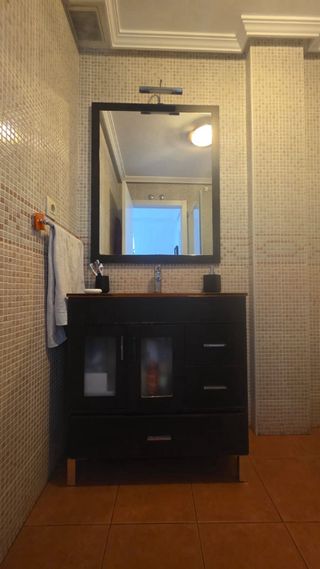 Espejo de baño con luz y mueble a conjunto