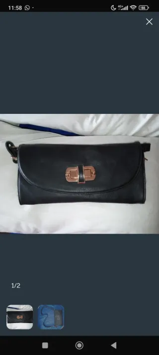 Bolso negro con cierre dorado