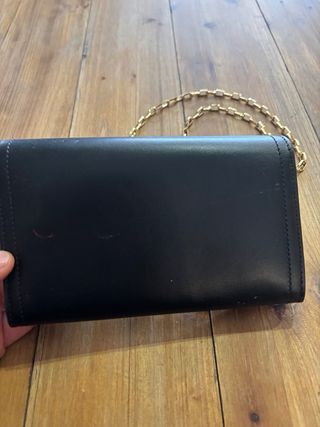 Borsetta Moschino nera con catena oro