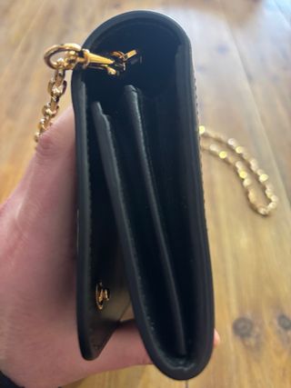 Borsetta Moschino nera con catena oro
