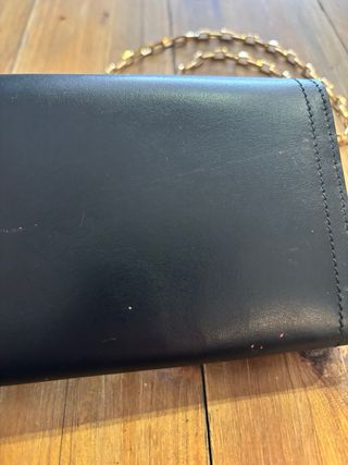 Borsetta Moschino nera con catena oro