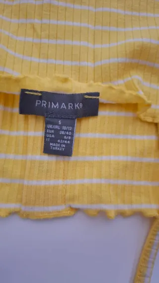 Top amarillo con rayas blancas