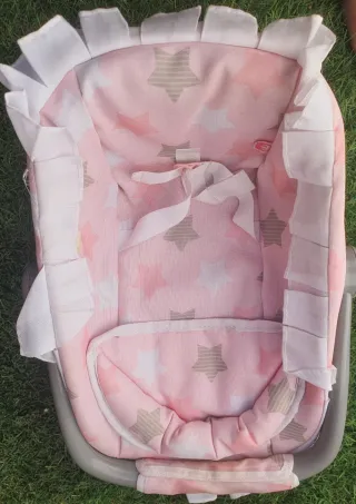 Porta bebés de juguete marca Mimittos