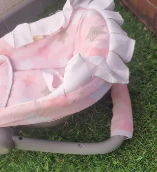 Porta bebés de juguete marca Mimittos