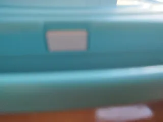 Xilófono infantil azul con baquetas