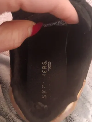 Skechers negras talla 36 con detalles dorados