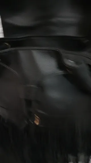 Zainetto nero con frange