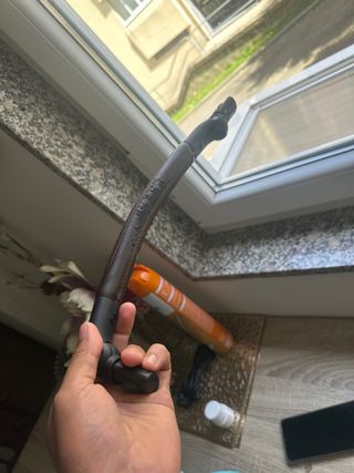 Cochecito de bebé negro y dorado