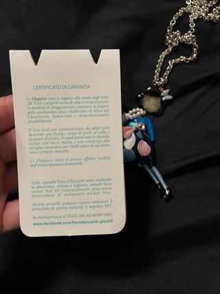 Collana lunga con bambola