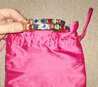 Bolso Uterqüe rosa con detalles multicolor