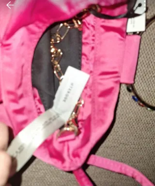 Bolso Uterqüe rosa con detalles multicolor