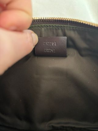 Pochette Gucci in pelle marrone