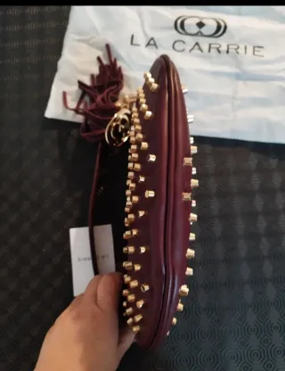 Borsa LA CARRIE Mezzaluna Pelle Borchie Oro