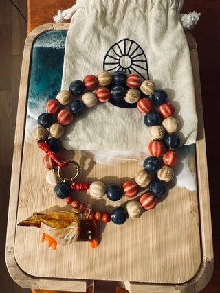 Collar con colgante de pájaro