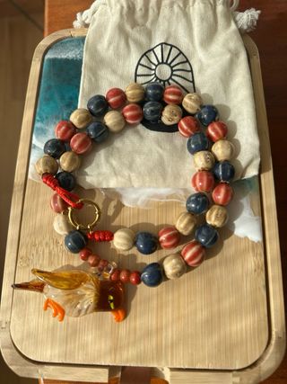 Collar con colgante de pájaro