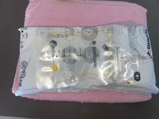 Confezione latte materno + tiralatte