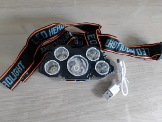 Linterna frontal LED con USB