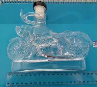 Botella de cristal con forma de moto