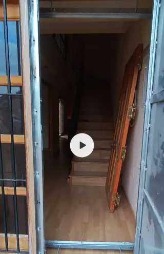Puerta antiocupa, forrado efecto madera 203*95