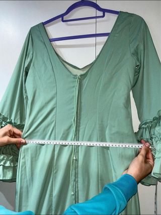 Traje de flamenca verde con volantes