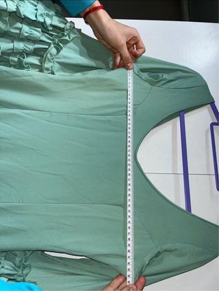 Traje de flamenca verde con volantes